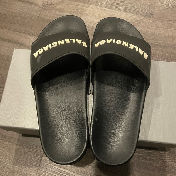 Black Balenciaga pool slides